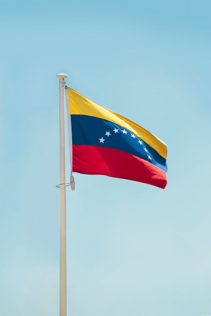 the flag of venezuela on a flag pole